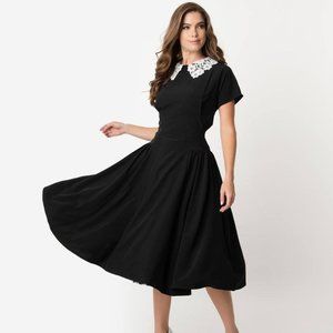 Unique Vintage black dress with lace collar